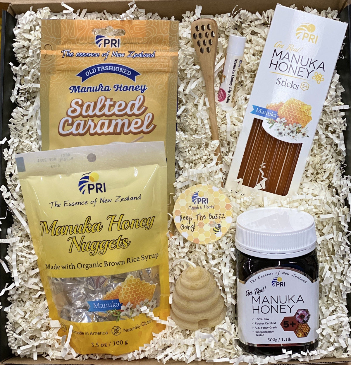 Manuka honey starter kit with honey jar, salted caramel, honey sticks, nuggets, dipper, and lip balm in gift box