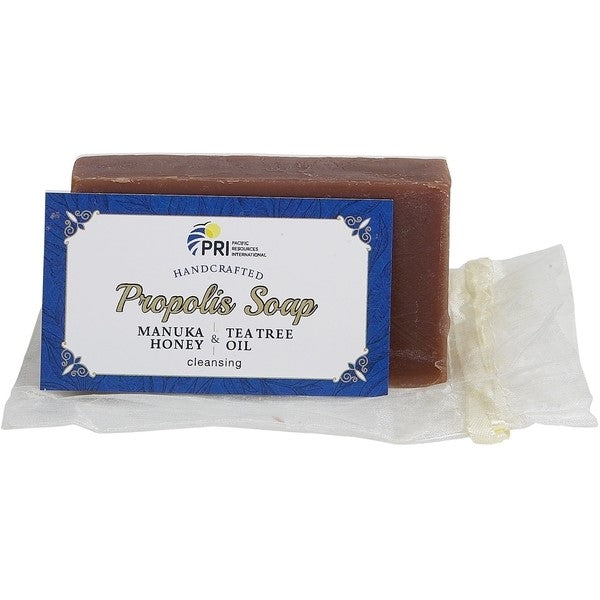Handcrafted propolis soap bar with Manuka and tea tree honey oil in clear packaging