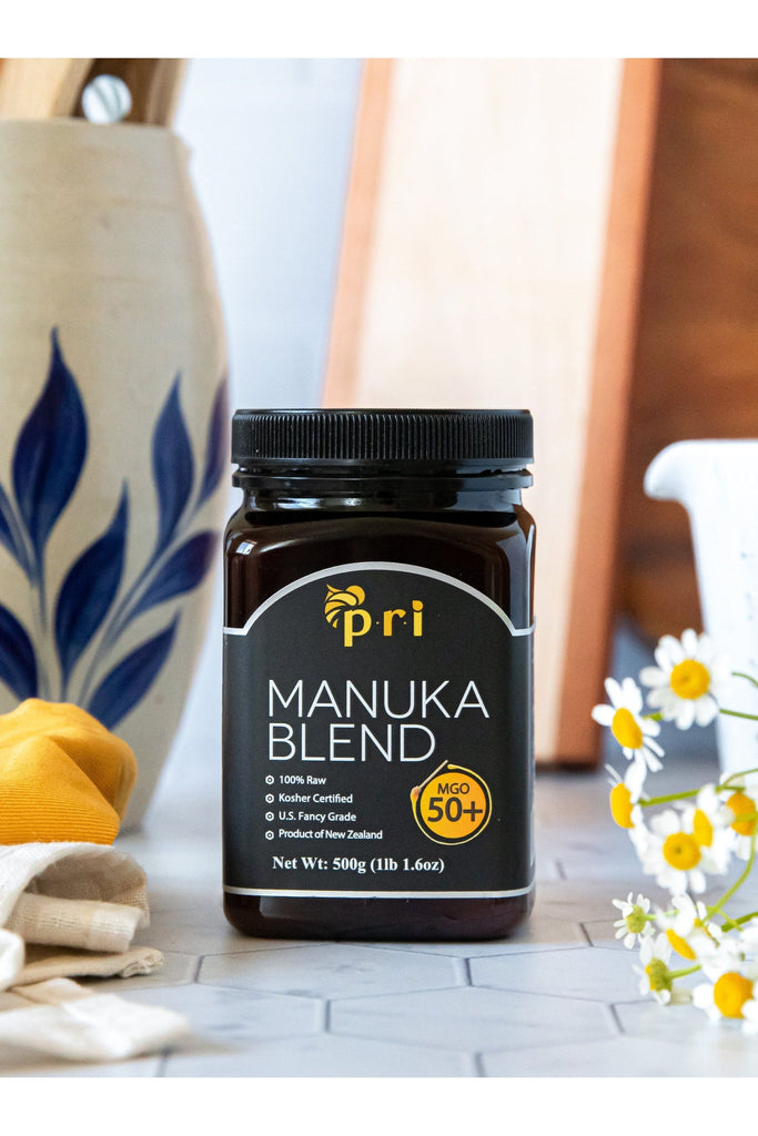 PRI - Manuka Honey Blend 50+ - Front with Background